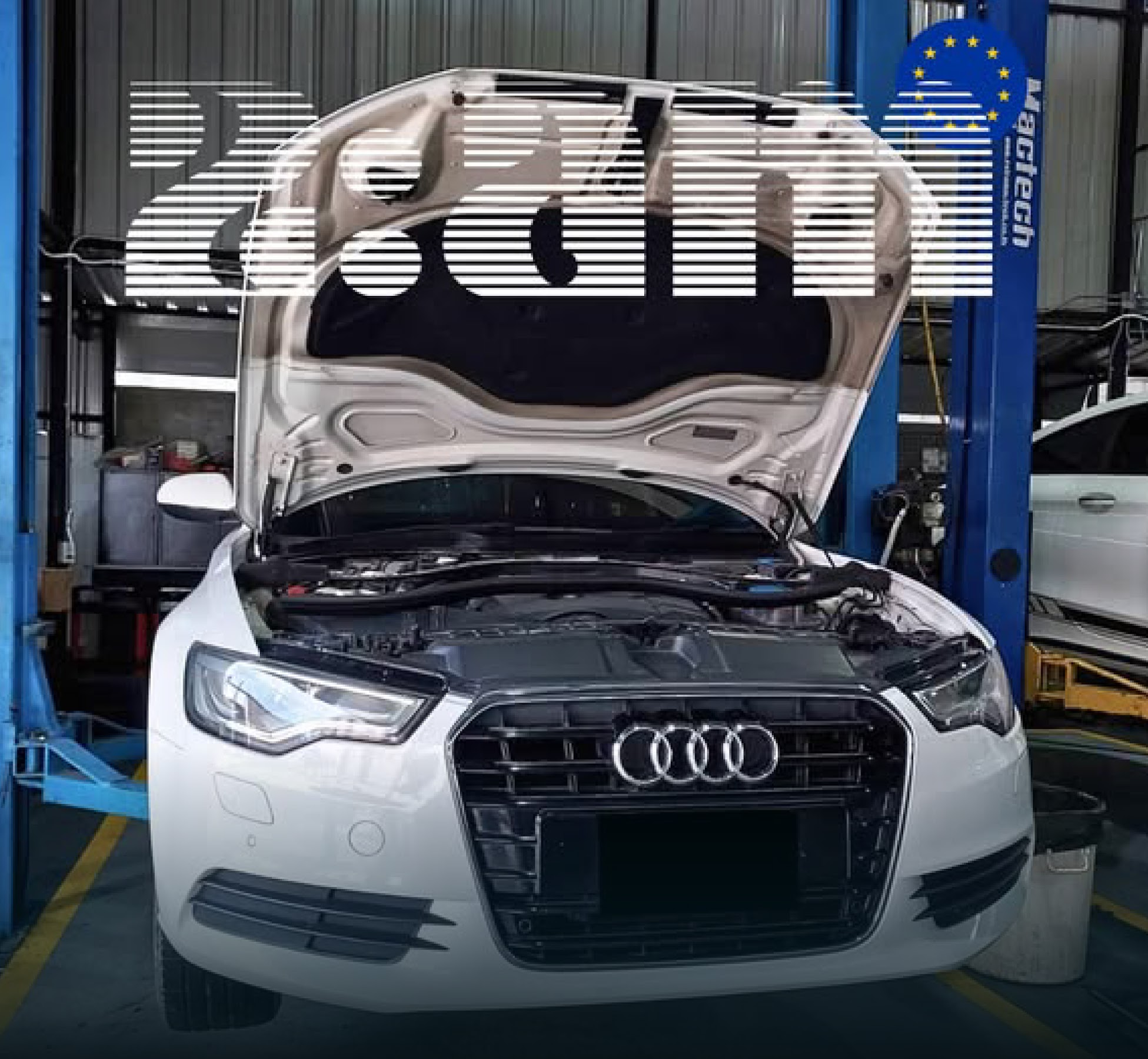 รถ Audi สีขาวเปิดฝากระโปรงบนลิฟต์ยกรถที่ 2AM Euro Service
